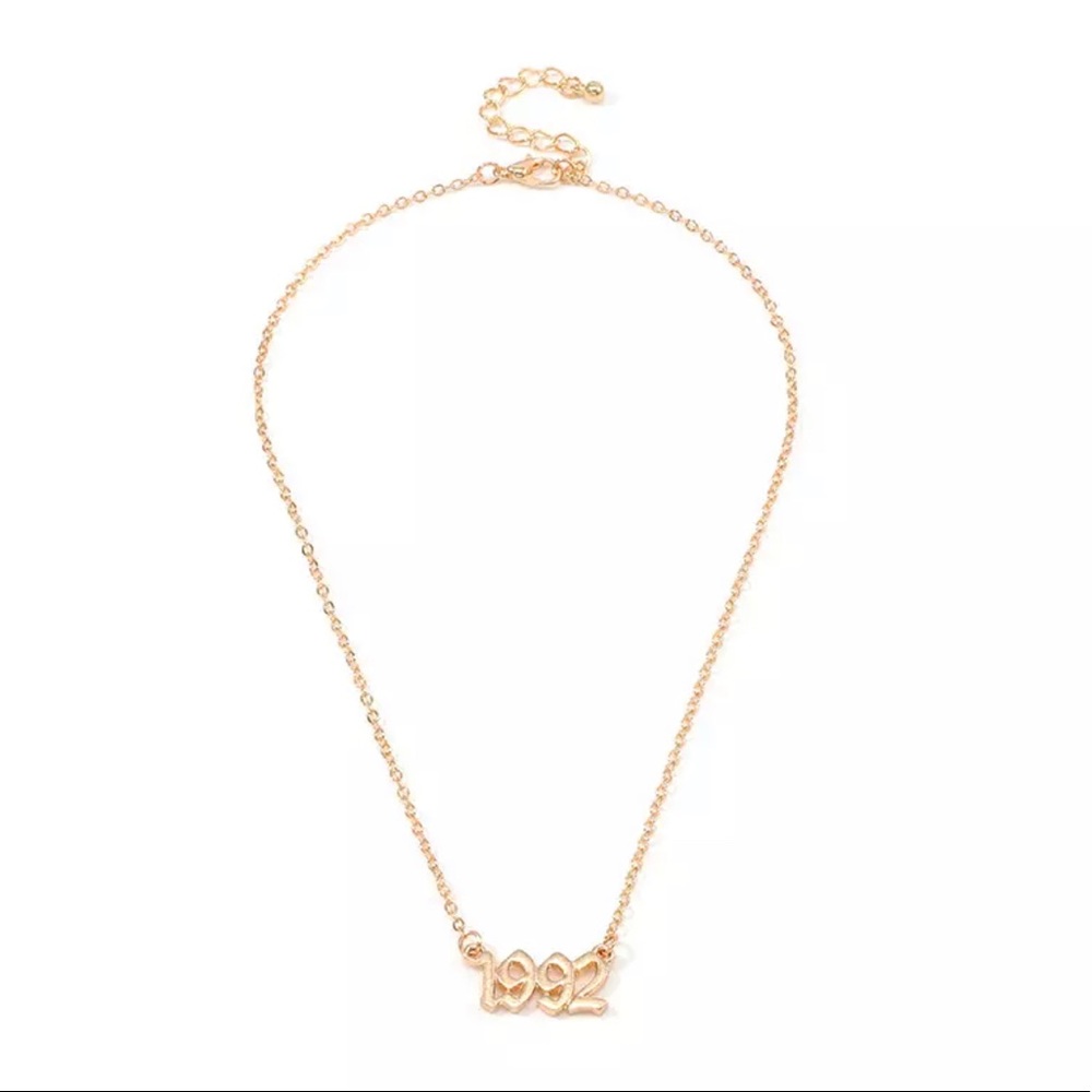 Stainless steel gold tone 1992 necklace